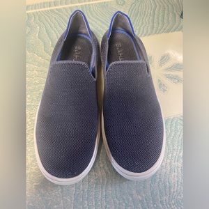 Rothy’s slip on sneakers. Dark grey. Loved condition but have life left.